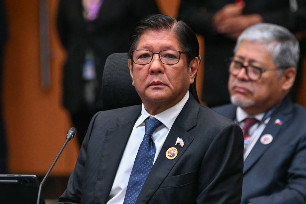 Philippines Marcos replaces foreign minister in reshuffle