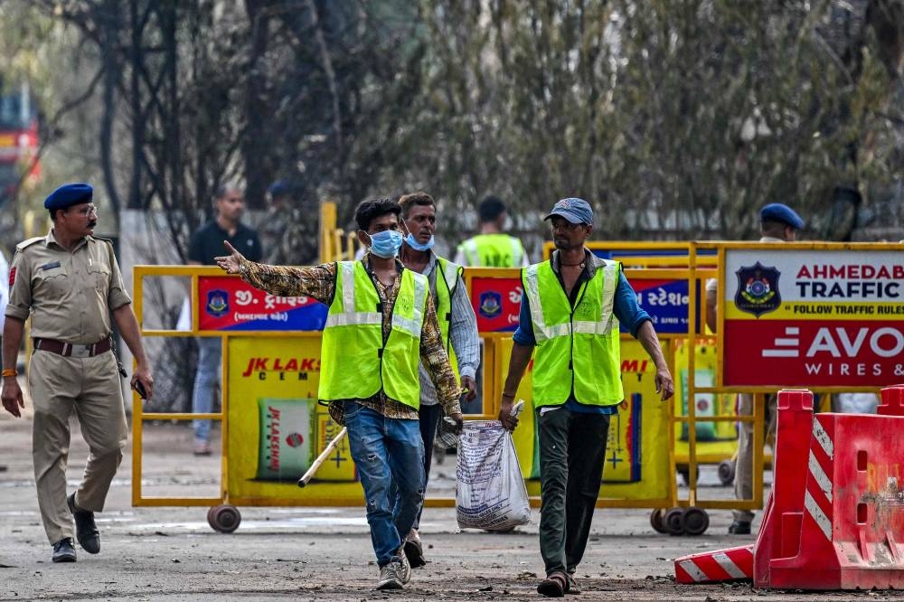 Relatives lament slow support, wait for remains after India crash