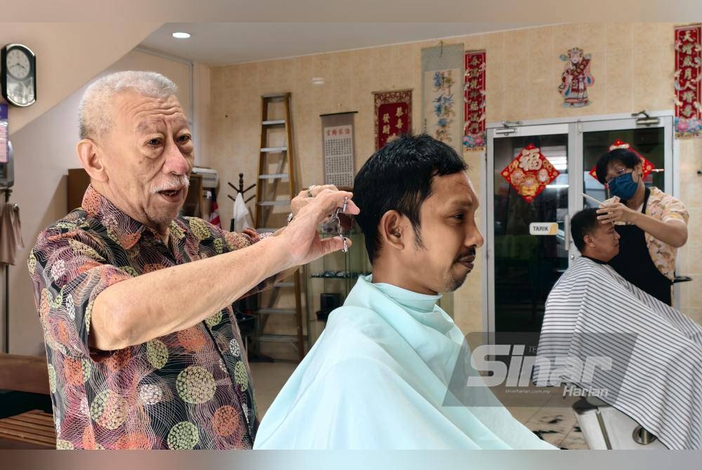 More than a haircut: Meet the Rembau barber who sings P. Ramlee songs flawlessly