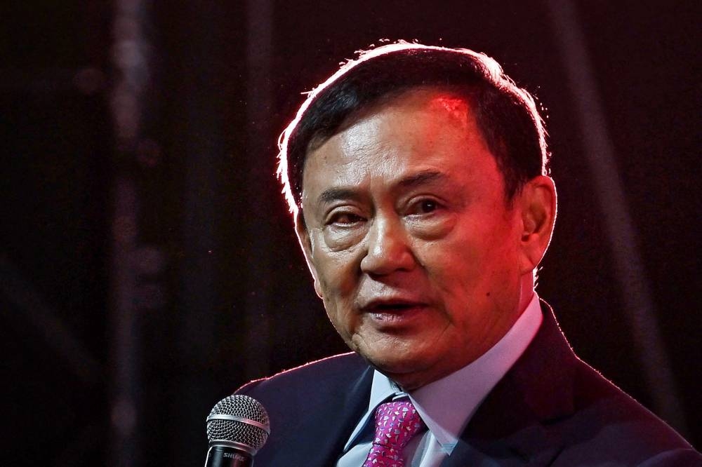 Thai ex-PM Thaksin due in dock for royal defamation case