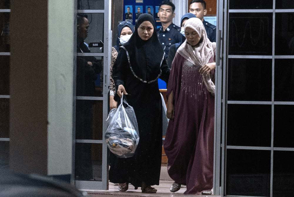 Two held in Thai drug case, including singer Eda Ezrin, return home
