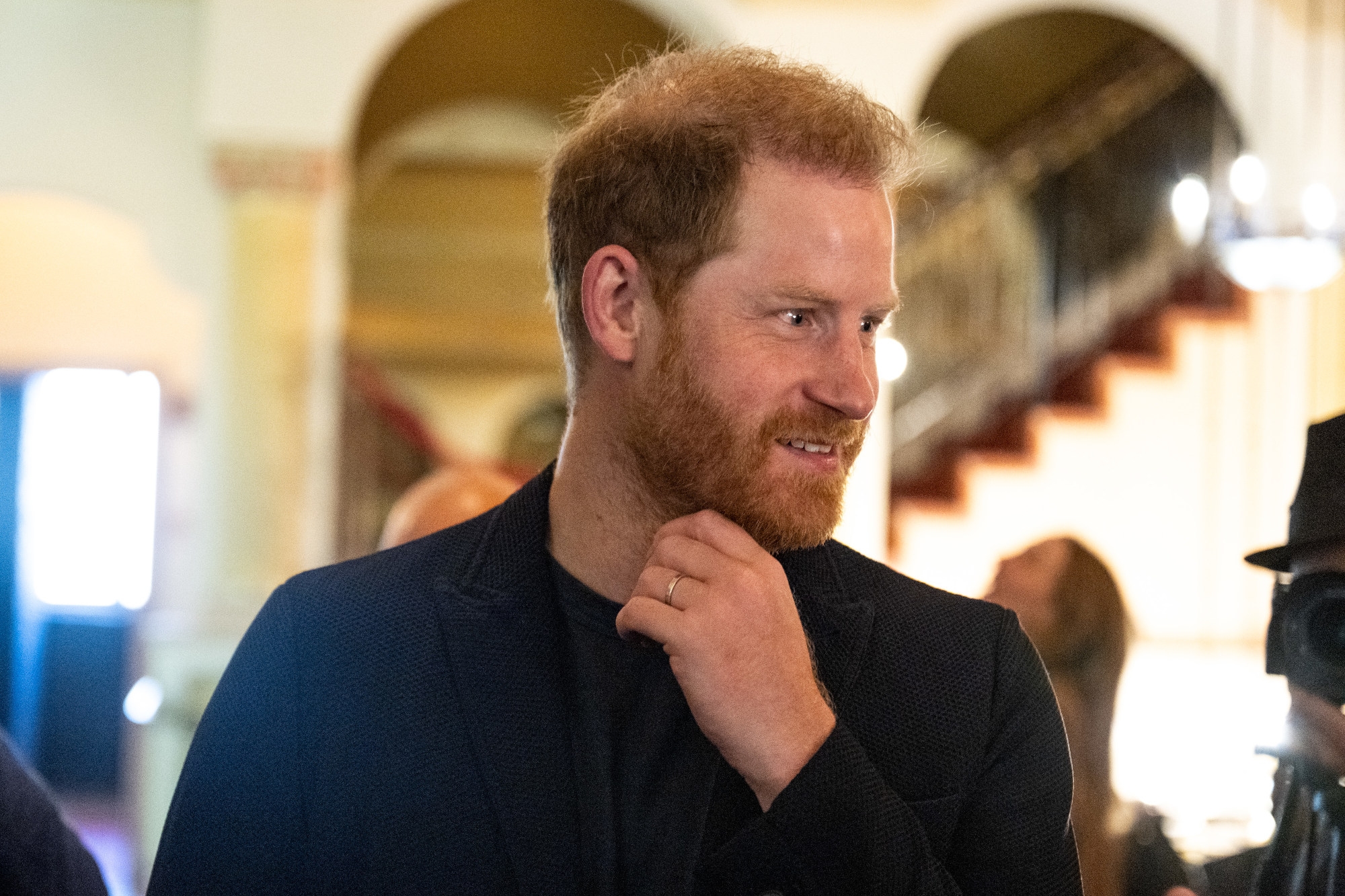 What is Prince Harry doing in China?