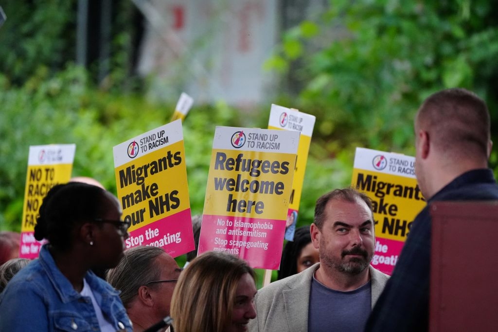 Soaring asylum costs threaten aid budget, watchdog warns Labour