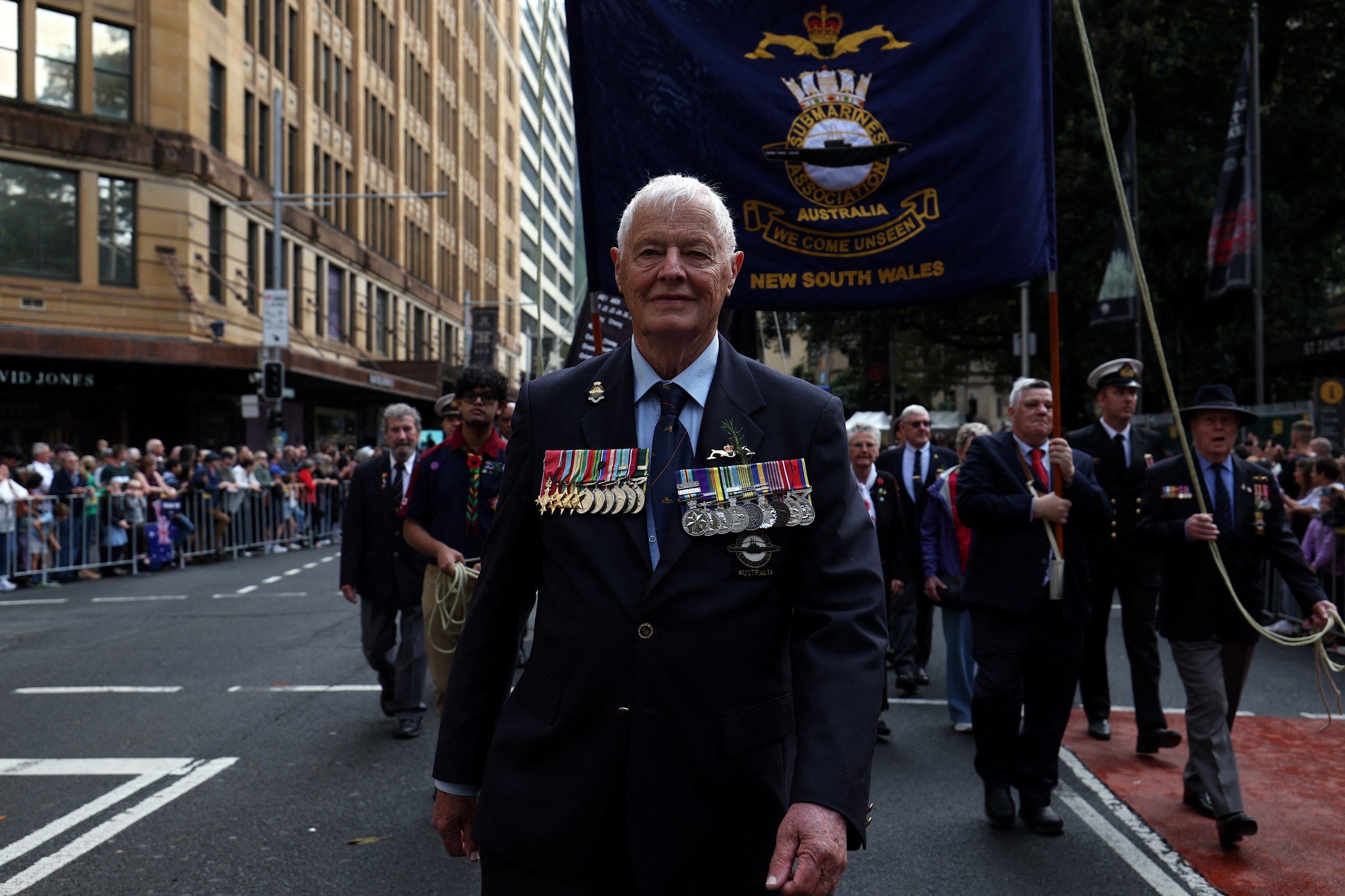 Crowds join Anzac Day services for Australia, New Zealand forces