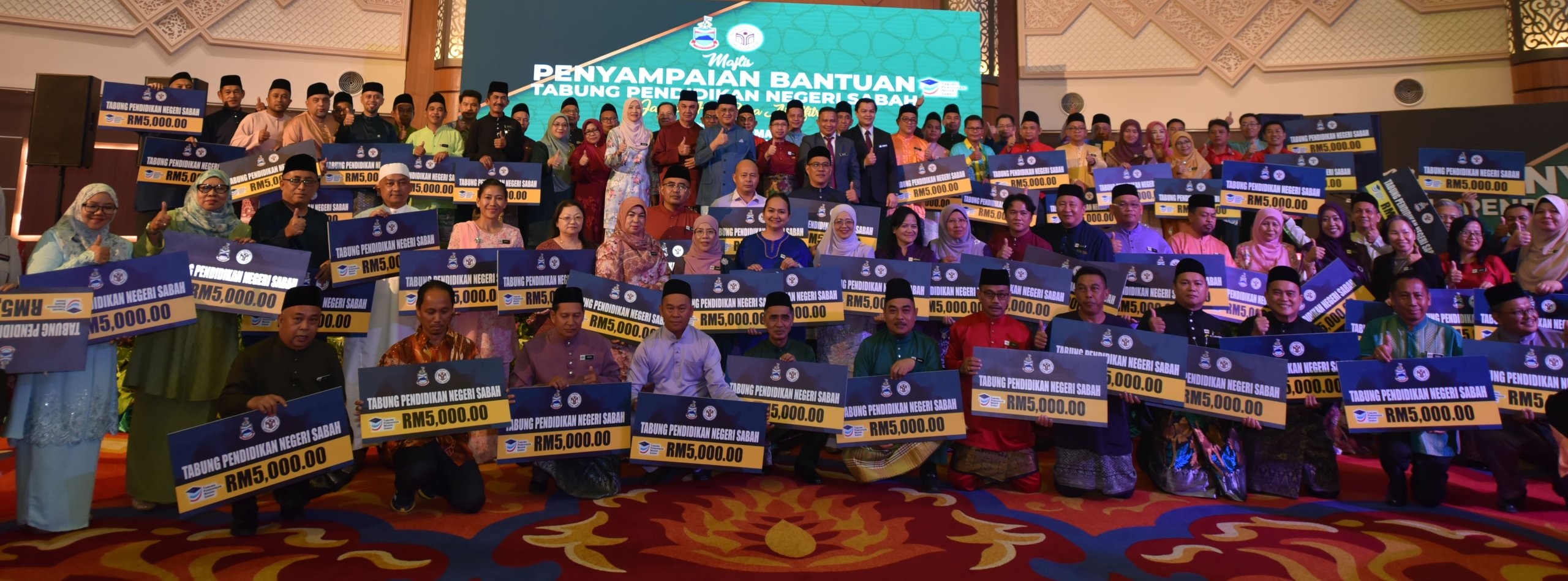 Sabah boosts education support by giving aid to flood-affected students, teachers