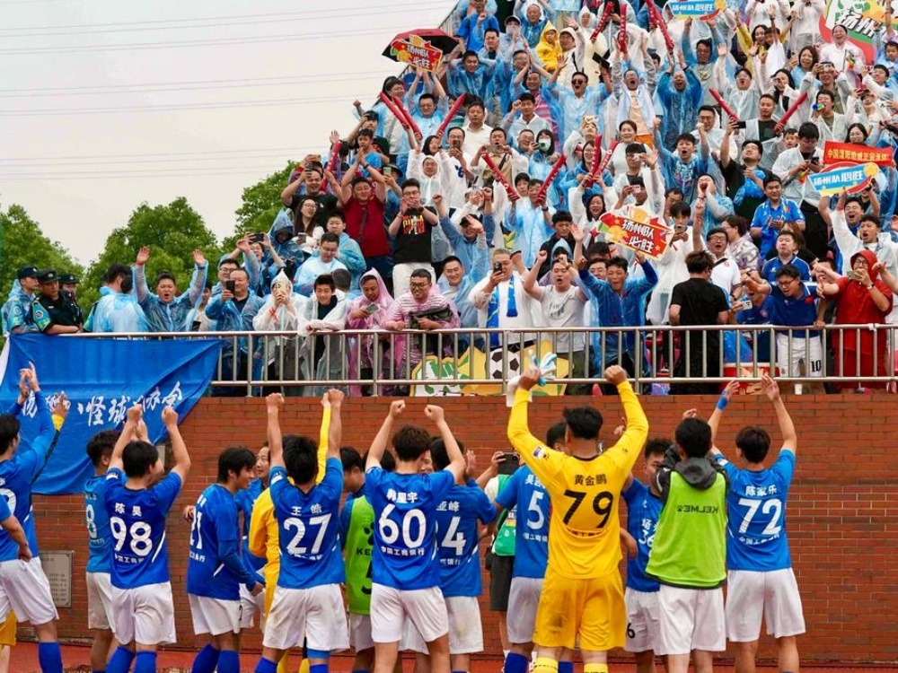 Goal! China's grassroots football scores economic wonder