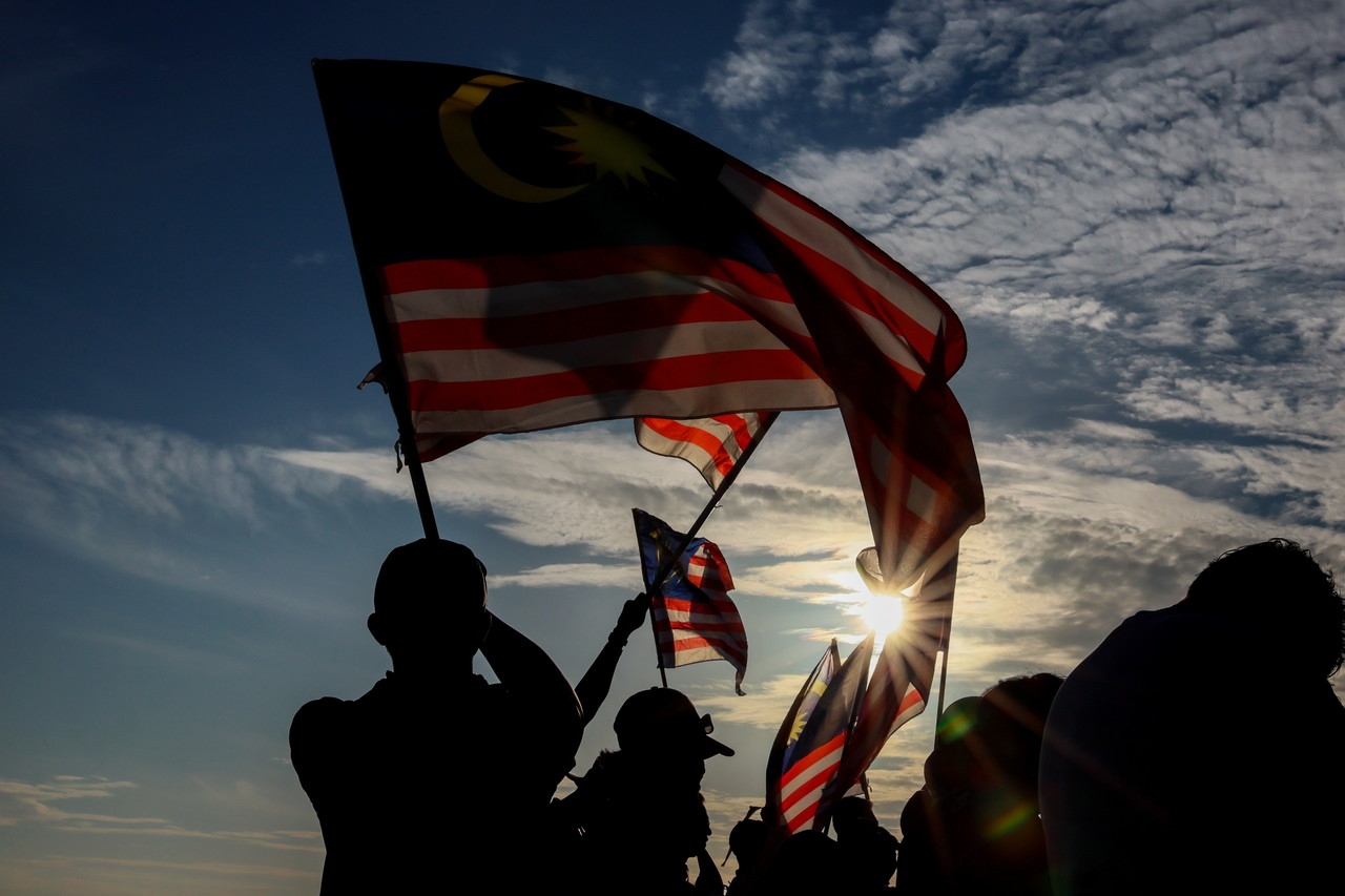 AGC warns Malaysians against vigilantism in Jalur Gemilang offence after Umno Youth's Kepala Batas protest