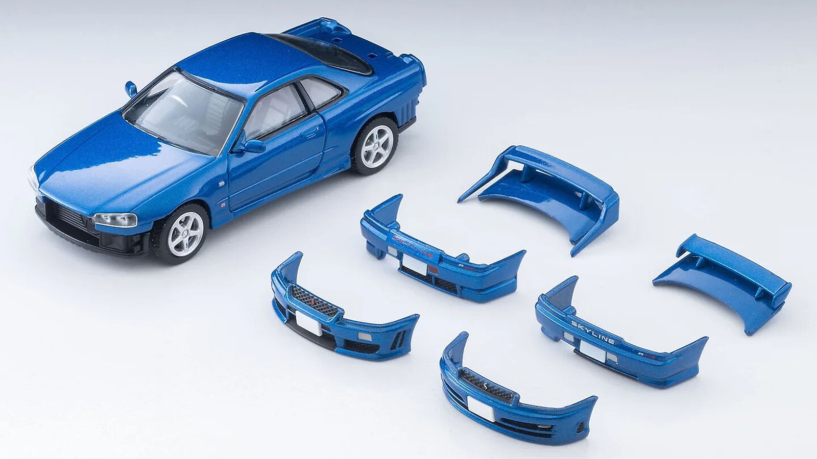This Die-Cast Nissan Skyline Lets You Swap Out Tiny Bumpers and Wings