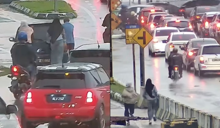 [Watch] Two Girls Help Uncle Push Car In Rain, Malaysia Applauds