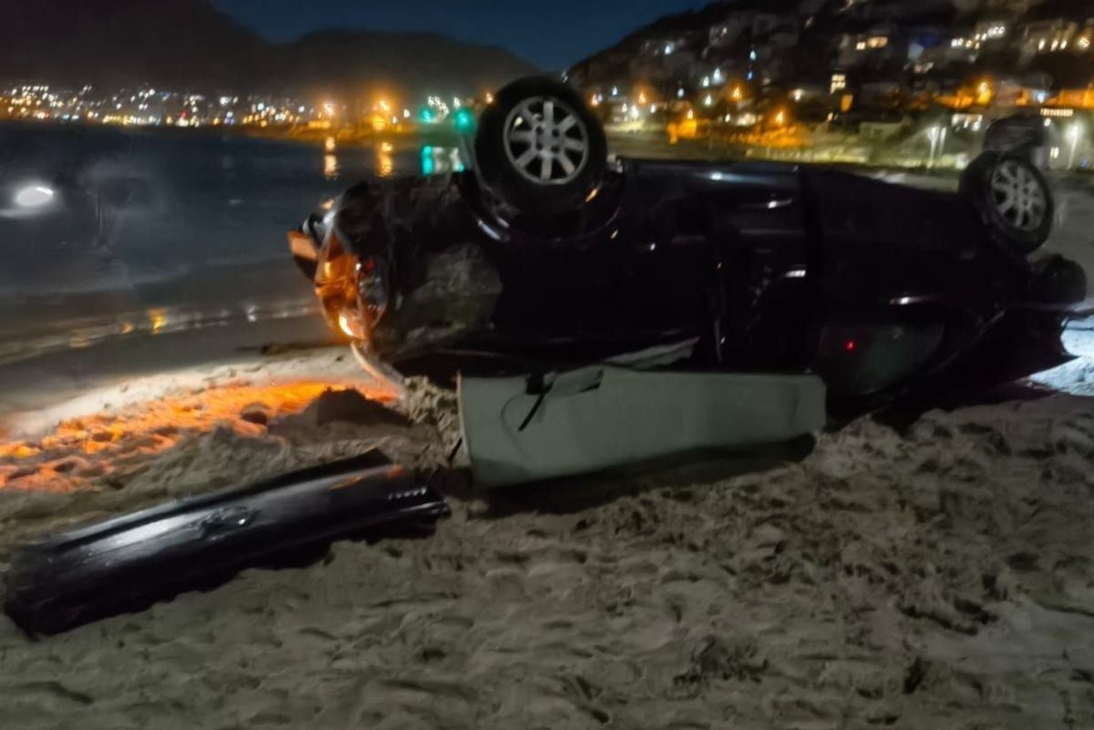Vehicle ends up on Glencairn Beach after horror crash