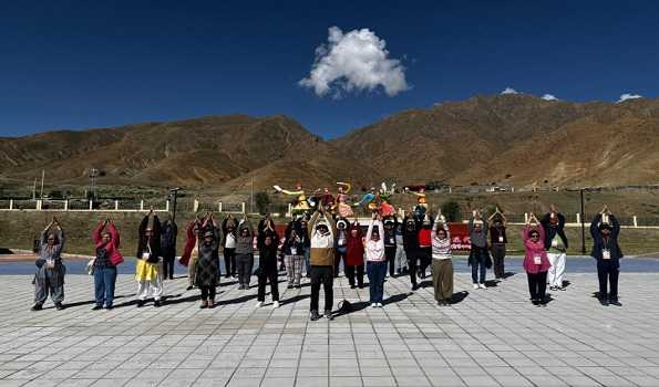 First batch of Kailash Mansarovar Yatris perform Yoga in Tibet to mark IYD