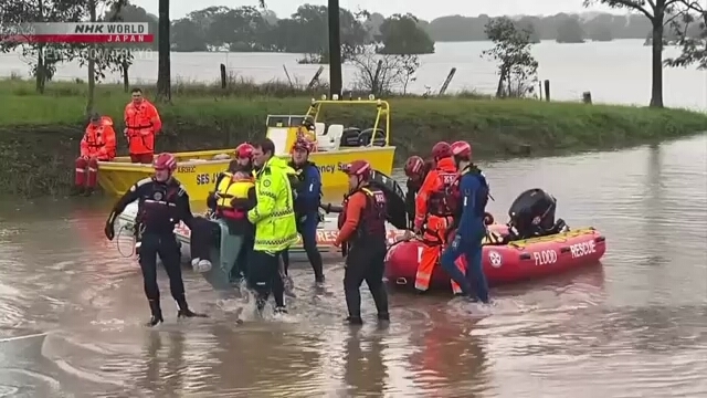 Record rainfall pelts Australia, floods kill at least 4