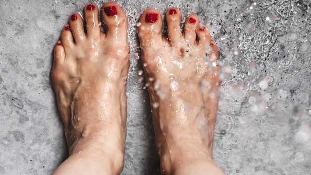 Your feet are home to billions of bacteria. How often should you wash them?