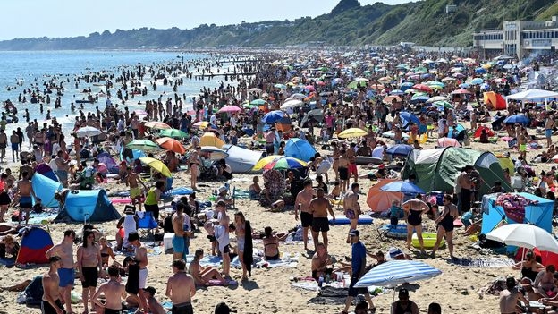 Covid 2020: The packed Covid beach described as 'Armageddon'